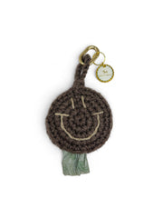 Smiley poop bag brown