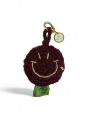 Smiley poop bag dark red